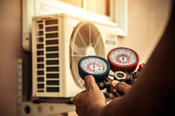 Professional Hvac technician working in Garrison, ND